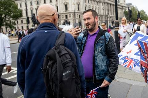 September 5, 2018 - London, London, UK - London, UK. NOTE: FILE PHOTO. James Goddard (right) videos a passerby during a Brexit demonstration in September. Goddard has been accused of being part of the group calling Conservative MP Anna Soubry a Nazi on Monday this week. ORIGINAL CAPTION: Anti-Brexit demonstrators and some far-right sympathisers campaign outside the Houses of Parliament, calling for Britain s immediate exit from the EU, and the re-instating of former Foreign Secretary Boris Johnson. London UK  - ZUMAl94_ 20180905_zaf_l94_094 Copyright: xTomxNicholsonx