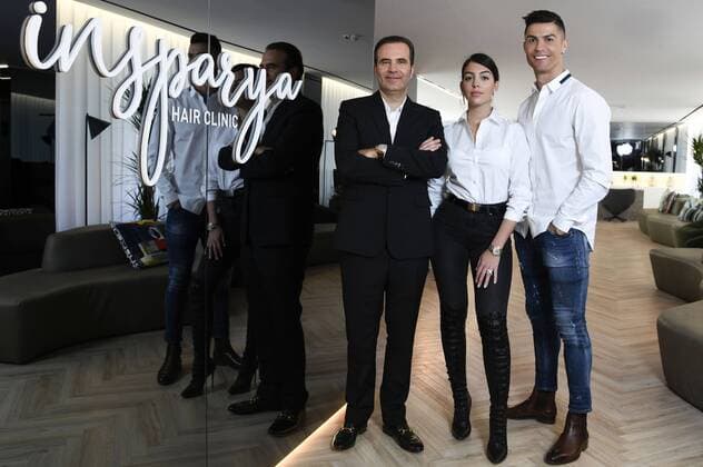 Entertainment Themen der Woche KW12 Entertainment Bilder des Tages Paolo Ramos, Georgina Rodriguez und Cristiano Ronaldo bei der Eröffnung der Haar-Transplantations-Klinik Insparya Hair Clinic . Madrid, 18.03.2019 Paolo Ramos, Georgina Rodriguez, Cristiano Ronaldo