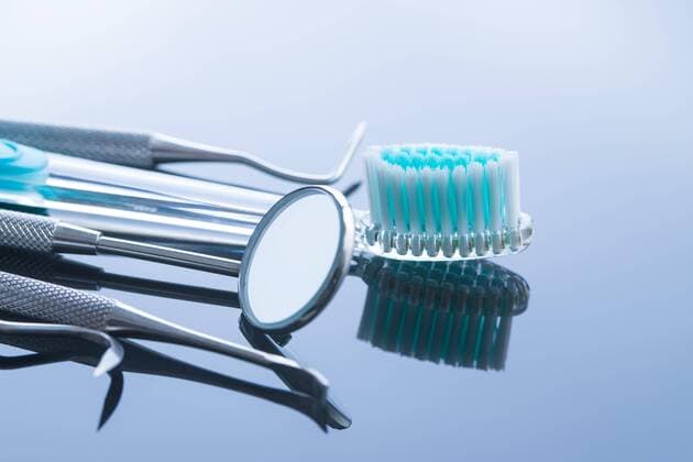 Dental instruments. Dentists tools and toothbrush.  Copyright: xjirkaejcx Panthermedia26187556