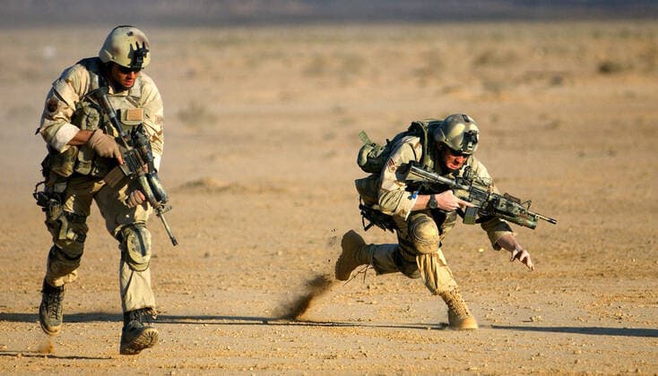 March 9, 2003 - Undisclosed - Combat controllers practice firing movements on the range at a forward-deployed location supporting Operation Enduring Freedom. Air Force combat controller teams are trained to conduct and support special operations under clandestine, covert or low-visibility conditions. Undisclosed - ZUMAz03_ 20030309_sha_z03_440 Copyright: xMasterxSgt.xJeremyxT.xLockx