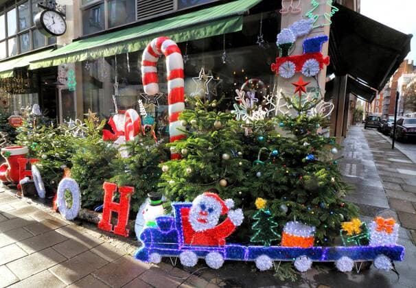 December 19, 2020, London, United Kingdom: Large display of Christmas trees and various Christmas decorations outside Hedonism wines in central London..Despite London being placed under extremely high Tier 4 restrictions to prevent the spread of Covid-19, with indoor venues, non essential retail and clubs all closed and inability to trade, there are many colourful Christmas displays around the city. London United Kingdom - ZUMAs197 20201219_zaa_s197_236 Copyright: xKeithxMayhewx