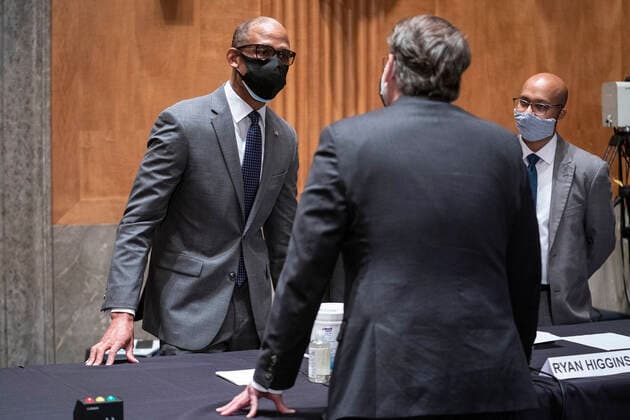 May 11, 2021, Washington, District of Columbia, USA: Ryan Higgins, chief information security officer at the U.S. Department of Commerce, left, speaks with United States Senator Gary Peters (Democrat of Michigan), Chairman, US Senate Committee on Homeland Security and Government Affairs, ahead of a committee hearing in Washington, D.C., U.S., on Tuesday, May 11, 2021. The hearing is titled Prevention, Response, and Recovery: Improving Federal Cybersecurity Post-SolarWinds. .Credit: Sarah Silbiger Pool via CNP Washington USA - ZUMAs152 20210511_zaa_s152_172 Copyright: xSarahxSilbigerx-xPoolxViaxCnpx
