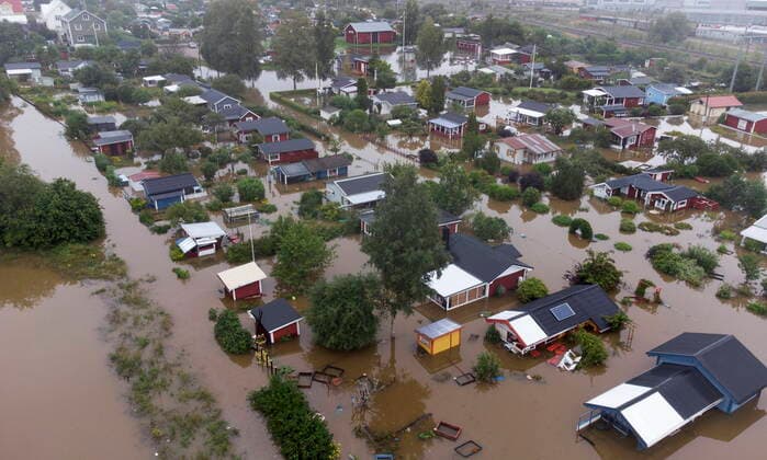 GÄVLE 20210818 Aerial view over a flooded residential area at Sodra Kungsvagen in Gavle, Sweden, Wednesday 18 Aug Due to heavy rains in eastern Sweden several roads and viaducts are flooded Photo Fredrik Sandberg TT kod 10080 STOCKHOLM Sverige x10080x,  Copyright: xFredrikxSandberg TTx WEATHER SWEDEN