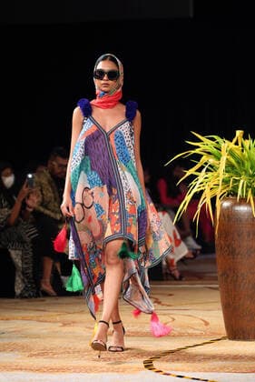 (211113) -- COLOMBO, Nov. 13, 2021 -- A model presents a creation during the Colombo Fashion Week (CFW) Swim Week in Colombo, Sri Lanka, on Nov. 12, 2021. The CFW Swim Week Colombo, scheduled for Nov. 12 and 13 in the national capital Colombo, will showcase works created by 11 local designers. (Photo by Xinhua) SRI LANKA-COLOMBO-FASHION WEEK AjithxPerera