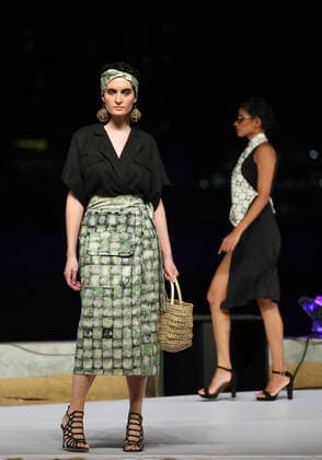 (211114) -- COLOMBO, Nov. 14, 2021 -- Models present creations during Colombo Fashion Week in Colombo, Sri Lanka, Nov. 13, 2021. The two-day Colombo Fashion Week this year in Sri Lanka was concluded with the last-day show held Saturday night at the marina of the Colombo Port City. (Photo by Xinhua) SRI LANKA-COLOMBO-FASHION WEEK AjithxPerera