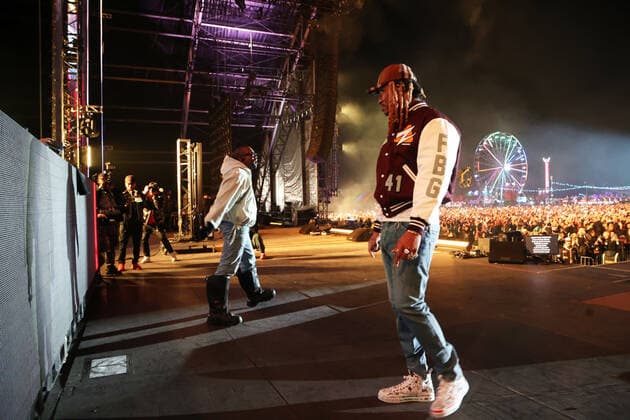 SAN BERNADINO, CA - DECEMBER 12: Kanye West surprise guest performance during Future s set at Rolling Loud California at the L.A. Coliseum in San Bernadino, California on December 12, 2021. Copyright: xWalikxGoshornx