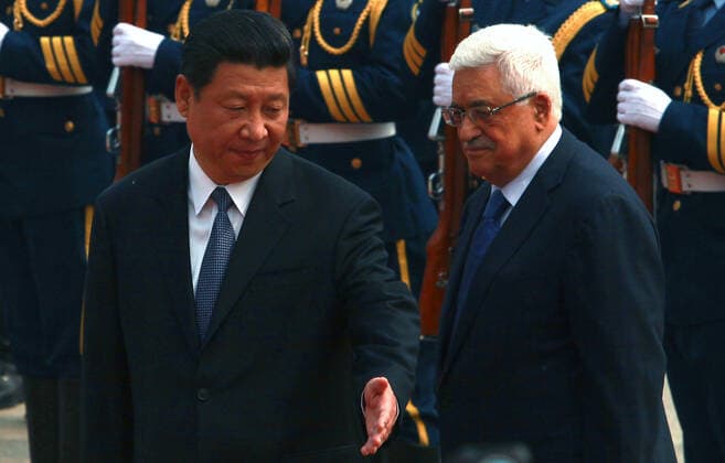 May 6, 2013, BEIJING, CHINA: Chinese President Xi Jinping (L) and visiting Palestinian President Mahmoud Abbas attend a welcoming ceremony at the Great Hall of the People in Beijing on May 6, 2013. China is hosting the leaders of Palestine and Israel this week in a sign of its desire for a larger role in the Middle East. China said it is willing to set up a meeting between the two countries, which have been deadlocked in talks for four years. BEIJING CHINA - ZUMAs139 20130506_zap_s139_027 Copyright: xStephenxShaverx