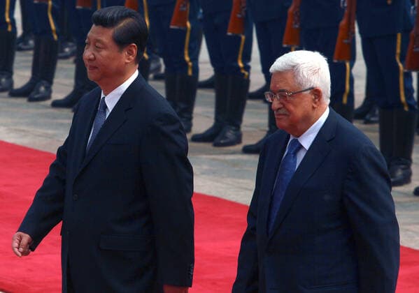 May 6, 2013, BEIJING, CHINA: Chinese President Xi Jinping (L) and visiting Palestinian President Mahmoud Abbas attend a welcoming ceremony at the Great Hall of the People in Beijing on May 6, 2013. China is hosting the leaders of Palestine and Israel this week in a sign of its desire for a larger role in the Middle East. China said it is willing to set up a meeting between the two countries, which have been deadlocked in talks for four years. BEIJING CHINA - ZUMAs139 20130506_zap_s139_028 Copyright: xStephenxShaverx