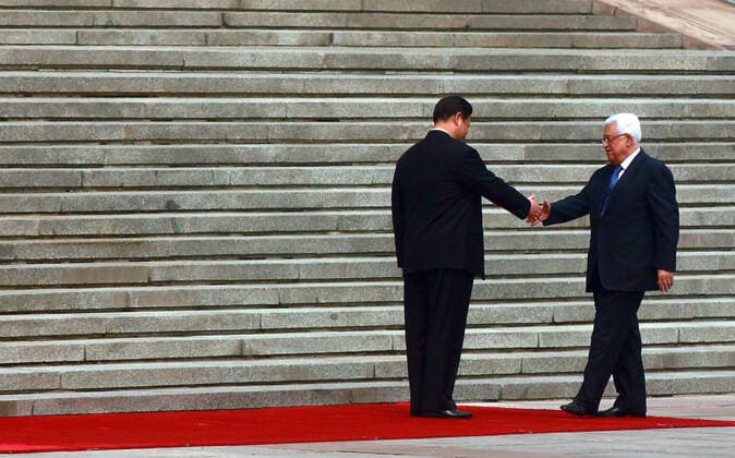 May 6, 2013, BEIJING, CHINA: Chinese President Xi Jinping (L) shakes hands with visiting Palestinian President Mahmoud Abbas during a welcoming ceremony at the Great Hall of the People in Beijing on May 6, 2013. China is hosting the leaders of Palestine and Israel this week in a sign of its desire for a larger role in the Middle East. China said it is willing to set up a meeting between the two countries, which have been deadlocked in talks for four years. BEIJING CHINA - ZUMAs139 20130506_zap_s139_007 Copyright: xStephenxShaverx