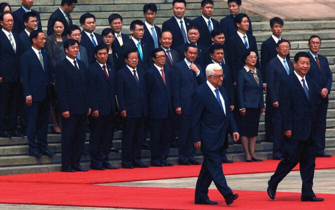 May 6, 2013, BEIJING, CHINA: Chinese President Xi Jinping (R) walks with visiting Palestinian President Mahmoud Abbas during a welcoming ceremony at the Great Hall of the People in Beijing on May 6, 2013. China is hosting the leaders of Palestine and Israel this week in a sign of its desire for a larger role in the Middle East. China said it is willing to set up a meeting between the two countries, which have been deadlocked in talks for four years. BEIJING CHINA - ZUMAs139 20130506_zap_s139_010 Copyright: xStephenxShaverx