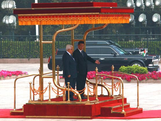 May 6, 2013, BEIJING, CHINA: Chinese President Xi Jinping (R) and visiting Palestinian President Mahmoud Abbas attend a welcoming ceremony at the Great Hall of the People in Beijing on May 6, 2013. China is hosting the leaders of Palestine and Israel this week in a sign of its desire for a larger role in the Middle East. China said it is willing to set up a meeting between the two countries, which have been deadlocked in talks for four years. BEIJING CHINA - ZUMAs139 20130506_zap_s139_013 Copyright: xStephenxShaverx