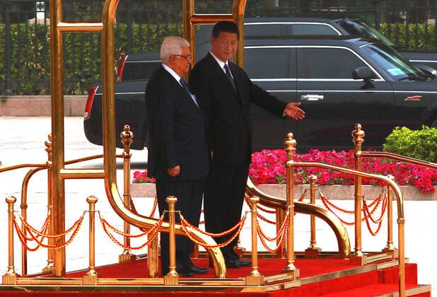 May 6, 2013, BEIJING, CHINA: Chinese President Xi Jinping (R) and visiting Palestinian President Mahmoud Abbas attend a welcoming ceremony at the Great Hall of the People in Beijing on May 6, 2013. China is hosting the leaders of Palestine and Israel this week in a sign of its desire for a larger role in the Middle East. China said it is willing to set up a meeting between the two countries, which have been deadlocked in talks for four years. BEIJING CHINA - ZUMAs139 20130506_zap_s139_014 Copyright: xStephenxShaverx