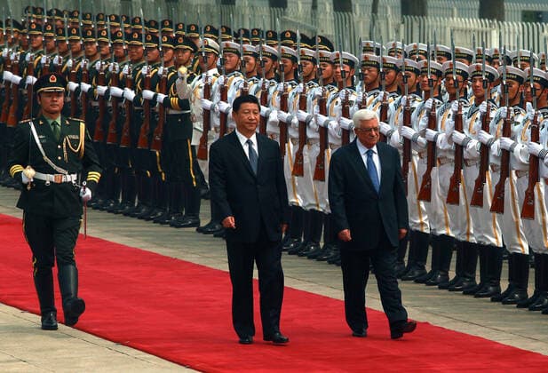 May 6, 2013, BEIJING, CHINA: Chinese President Xi Jinping (L) and visiting Palestinian President Mahmoud Abbas attend a welcoming ceremony at the Great Hall of the People in Beijing on May 6, 2013. China is hosting the leaders of Palestine and Israel this week in a sign of its desire for a larger role in the Middle East. China said it is willing to set up a meeting between the two countries, which have been deadlocked in talks for four years. BEIJING CHINA - ZUMAs139 20130506_zap_s139_015 Copyright: xStephenxShaverx