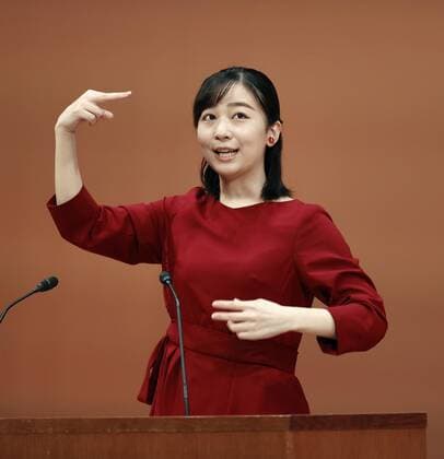 Sign language contest in western Japan Japanese Princess Kako speaks in sign language during the opening ceremony of a national high school sign language contest in the Tottori Prefecture city of Kurayoshi, western Japan, on Sept. 25, 2022.  A14AA0001339657P