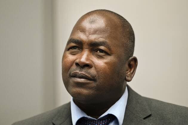 2022-09-26 09:29:51 Mahamat Said Abdel Kani enters the court room of the International Criminal Court in The Hague, Netherlands, Monday, Sept. 26, 2022. The trial of an alleged commander in a mainly Muslim rebel group from Central African Republic opened and charged Said with crimes against humanity and war crimes. (AP Photo Peter Dejong, Pool) netherlands out - belgium out