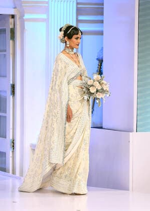 (221118) -- COLOMBO, Nov. 18, 2022 -- A model presents a creation during the Colombo Fashion Week in Colombo, Sri Lanka, Nov. 17, 2022. (Photo by Xinhua) SRI LANKA-COLOMBO-FASHION WEEK AjithxPerera