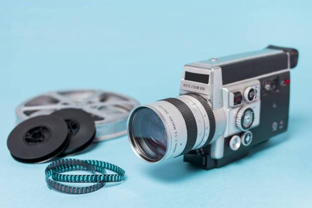 Filmspulen Filmstreifen Vintage Camcorder blauer Hintergrund Copyright: imageBROKER OleksandrxLatkun ibxole08509487.jpg