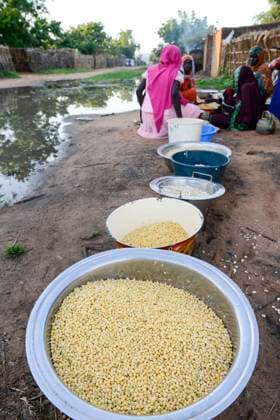 CHAD , Goz Beida, Djabal refugee camp CHAD, Goz Beida, refugee camp Djabal for refugees from Darfur, Sudan, women with food aid at grain mill