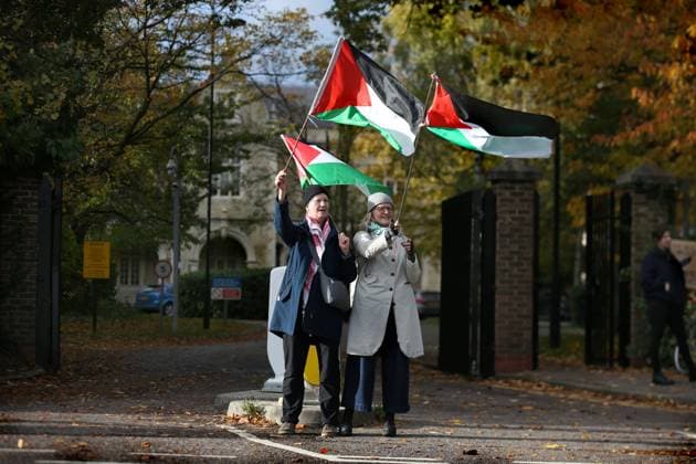 November 13, 2023, London, United Kingdom: Supporters gather outside Snaresbrook Crown Court to and wave flags in solidarity with the defendants. Palestinian Actionists known as ˜The Elbit Eight™ are facing conspiracy charges to commit criminal damage, burglary and some of them, blackmail, against Israeli arms company Elbit systems. The charges go back to 2020. Six weeks have been set aside at court. Palestine Action believe that Elbit™s businesses in the UK manufacture drones that are being used in Gaza and elsewhere against the Palestinian people. Their direct actions against Elbit Systems in the UK have already seen two of their 10 sites closed down. London United Kingdom - ZUMAs197 20231113_aaa_s197_440 Copyright: xMartinxPopex