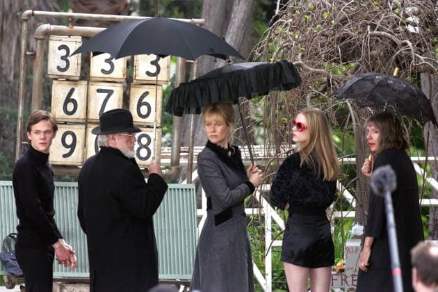 UK SALES ONLY Gwyneth Paltrow on the set of her latest movie Running with Scissors. 3732 LOS ANGELES, CALIFORNIA - Monday April 4 2005. Gwyneth Paltrow on the last day of filming her latest movie Running With Scissors . A smiling Gwyneth was joined on set by (l-r) Brian Cox, Evan Rachel Wood and Jill Clayburgh. Running with Scissors is the true story of a boy whose mother (a poet with delusions of Anne Sexton) gave him away to be raised by her psychiatrist, a dead ringer for Santa and a lunatic in the bargain. Suddenly, at age twelve, Augusten Burroughs found himself living in a dilapidated Victorian house in perfect squalor. Dr. Finch s (Brian Cox) bizarre family, a few patients and a pedophile living in the backyard shed co  Copyright: xDanielxMayerx xAvalonx 0520040778