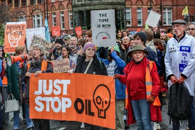 November 18, 2023, London, United Kingdom: Supporters of Just Stop Oil march across London behind large banners saying Just Stop Oil . Just Stop Oil march across London to highlight the need to change the way we depend on oil and gas for energy. They argue that time is running out for the planet and immediate change away from fossil fuels is necessary. They state the government is imprisoning peaceful protestors and protecting the real criminals, rewarding them by licensing more than 100 new oil and gas projects. London United Kingdom - ZUMAs197 20231118_aaa_s197_121 Copyright: xMartinxPopex