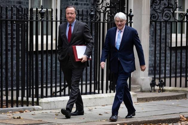 November 22, 2023, London, United Kingdom: Lord David Cameron and Andrew Mitchell leave a cabinet meeting in Downing Street, London. Later, Chancellor Jeremy Hunt will present his Autumn Statement to Parliament. London United Kingdom - ZUMAs197 20231122_aaa_s197_349 Copyright: xTejasxSandhux