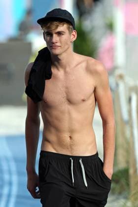 Cindy Crawford s model son Presley Gerber and a pretty brunette soak up the sun on Miami Beach 172618, Cindy Crawford s model son Presley Gerber and a pretty brunette soak up the sun on Miami Beach. Miami, Florida - Thursday December 7, 2017.,  Copyright: xThibaultxMonnier LCD,xPacificCoastNewsx xAvalonx 0533427277