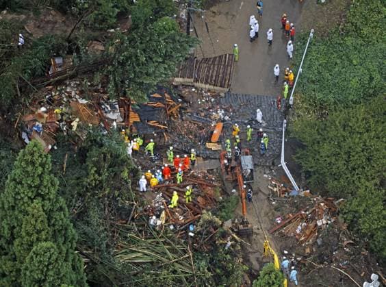 Landslide in central Japan Photo taken from a Kyodo News helicopter on Aug. 28, 2024, shows rescue operations under way at the site of a landslide that occurred the previous day in the Aichi Prefecture city of Gamagori, as heavy rain hit the central Japan city due to the approach of Typhoon Shanshan, leaving four members of a family who lived in a house at the site missing.  A14AA0003341963P