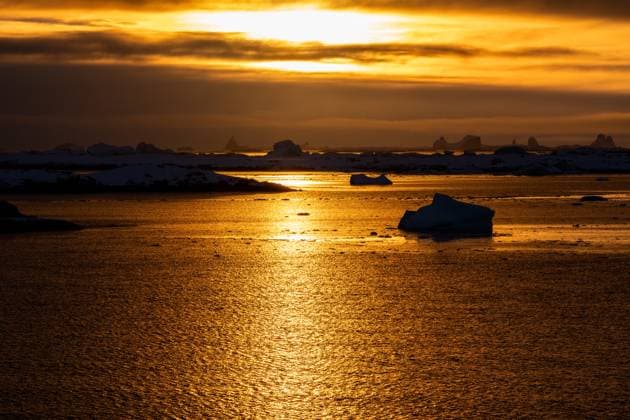 Sunset in Antarctica. Golden hours Vernadsky Research Base, Antarctica CR_HYVK240806-1509167-01