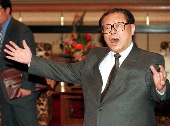 Jiang Zemin uses his facial expression to praise Tung Chee-hwa s achievement while being questioned by the media in the meeting between Jiang and Tung in Beijing, where the National People s Congress (NPC) is currently being held in the Great Hall of the People.