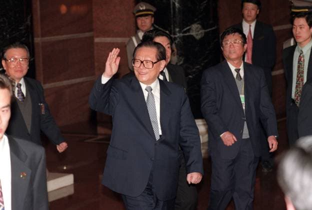 Chinese president Jiang Zemin waves as he leaves a meeting during the Fifth Session of the Eight NPC & CPPCC, march 1, 1997. SCMP PHOTO