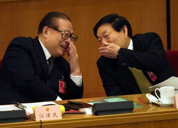President Jiang Zemin (left) and Premier Zhu Rongji of the People s Republic of China sharing a joke during the second plenary session of the National People s Congress (NPC) at the Great Hall of the People, Beijing.