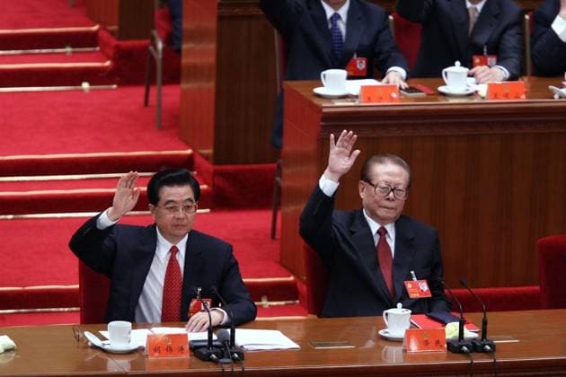 China s President Hu Jintao (L) and former president Jiang Zemin during the concluding session of the 17th Party Congress at the Great Hall of the People in Beijing. Beijing. 21 October 2007.