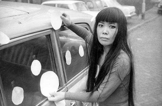 Kusama: Infinity (2018) - filmstill Kusama: Infinity (2018) Artist Yayoi Kusama next to her ÒDot CarÓ (1965) - - - EDITORIAL USE ONLY Copyright: xHarriexVerstappenx