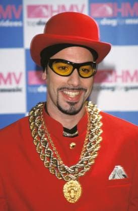 Launches And Signs Copies Of His New Book Da Gospel According To Ali G ALI G (SACHA BARON COHEN) Launches And Signs Copies Of His New Book Da Gospel According To Ali G At HMV, Oxford St Ref: 11171 red suit, bowler hat, jewellery, heashot, portrait, sunglasses, shades London Great Britain Copyright: xHughxThompson CapitalxPicturesx