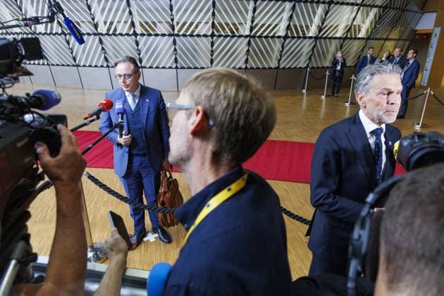 Belgian Prime Minister Bart De Wever and Dutch Prime Minister Dick Schoof pictured at the arrivals ahead of an European council summit (26-27 06), in Brussels, Thursday 26 June 2025.  NICOLASxMAETERLINCK 127840782