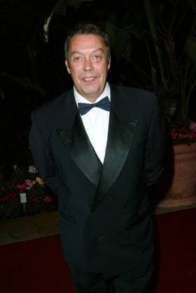 CLIVE DAVIS PARTY Feb. 26, 2002 - Los Angeles, CALIFORNIA - CLIVE DAVIS PRE-GRAMMY PARTY.AT THE BEVERLY HILLS HOTEL LOS ANGELES CA..TIM CURRY. FITZROY BARRETT 2-26-2002 K24194FB (D) Copyright: xFitzroyxBarrettx