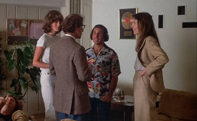 Woody Allen, Paul Simon and Diane Keaton USA. Woody Allen, Paul Simon and Diane Keaton in (C)United Artists film: Annie Hall (1977). Plot: Alvy Singer, a divorced Jewish comedian, reflects on his relationship with ex-lover Annie Hall, an aspiring nightclub singer, which ended abruptly just like his previous marriages. LMK110-J11338-151025 Supplied by LMKMEDIA. Editorial Only. Landmark Media is not the copyright owner of these Film or TV stills but provides a service only for recognised Media outlets. 