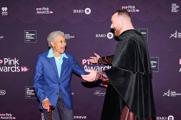 November 6, 2025, Toronto, On, Canada: Beverly Glenn-Copeland (left) and Sam Smith walk the red carpet at the 2025 PTP Pink Awards in Toronto, on Thursday, Nov. 6, 2025. Toronto Canada  - ZUMAc35_ 20251106_zaf_c35_188 Copyright: xSammyxKoganx
