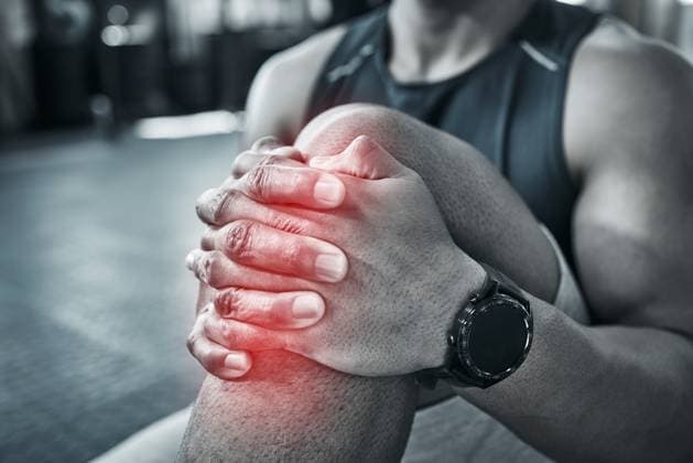 Fitness, person and hands for knee pain on gym floor of wrong workout technique, injury recovery exercise and tendinitis. Man, red glow and muscle ache of strain on leg, training and osteoporosis. Fitness, person and hands for knee pain on gym floor of wrong workout technique, injury recovery exercise and tendinitis. Man, red glow and muscle ache of strain on leg, training and osteoporosis, model released, , property released, , 61774142.jpg RECORD DATE NOT STATED