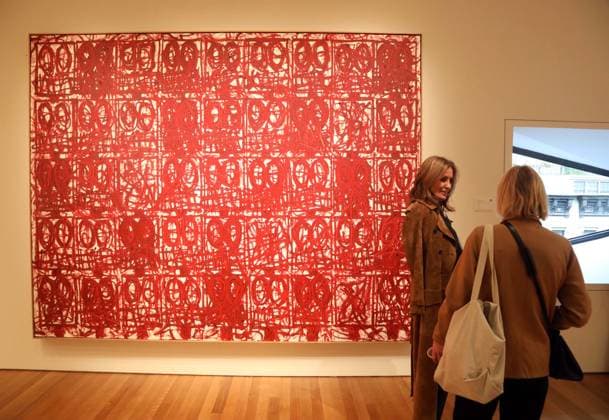 November 7, 2025, New York, New York, USA: Two women seen with Anxious Red Painting August 20th by artist Rashid Johnson, estimate $1 million - $1.5 mlllion, during November Marquee Week 2025 during SothebyÃ¢â‚¬â ¢s Opening of the New Global Headquarters at the Breuer. New York USA - ZUMAk03_ 20251107_zaf_k03_071 Copyright: xNancyxKaszermanx