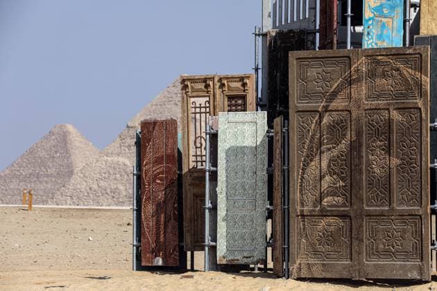 (251111) -- CAIRO, Nov. 11, 2025 -- An artistic installation is displayed during the Forever Is Now international art exhibition at Giza Pyramids scenic spot in Giza, Egypt, Nov. 11, 2025. The fifth edition of Forever Is Now international art exhibition on Tuesday kicked off in the area of Egypt s Giza Pyramids scenic spot, showcasing 10 artworks of artists from different countries. The exhibition runs from Nov. 11 to Dec. 6. Ahmed Gomaa) EGYPT-GIZA-PYRAMIDS-ART EXHIBITION-FOREVER IS NOW AixHamaide¡¤gema 