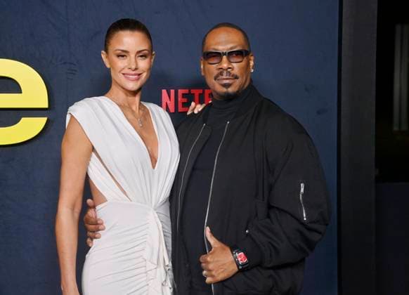 Actor Eddie Murphy and his wife Paige Butcher attend the premiere of Netflix s biographical documentary Being Eddie at the Tudum Theater Los Angeles on Wednesday, November 12, 2025. Storyline: Follows a comprehensive look at Eddie Murphy s life and career.  LAP2025111202 JIMxRUYMEN