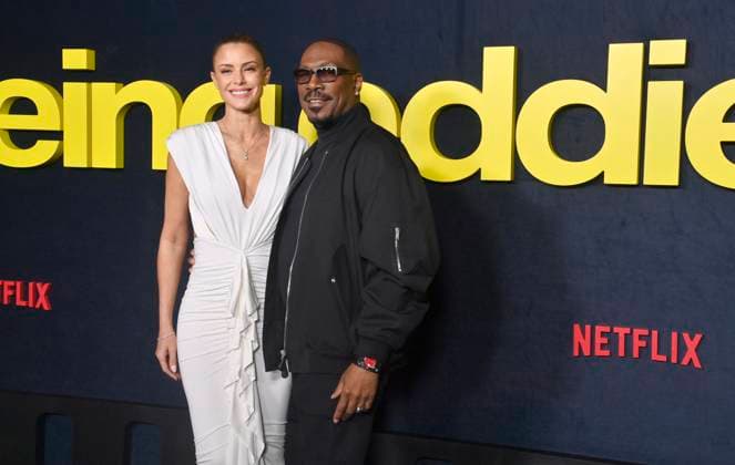 Actor Eddie Murphy and his wife Paige Butcher attend the premiere of Netflix s biographical documentary Being Eddie at the Tudum Theater Los Angeles on Wednesday, November 12, 2025. Storyline: Follows a comprehensive look at Eddie Murphy s life and career.  LAP2025111203 JIMxRUYMEN