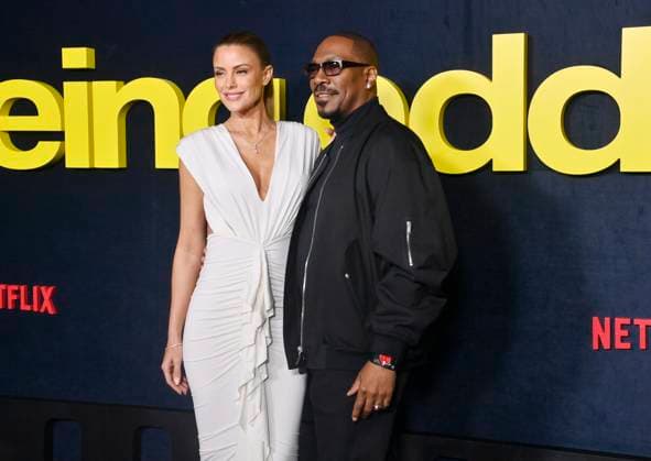 Actor Eddie Murphy and his wife Paige Butcher attend the premiere of Netflix s biographical documentary Being Eddie at the Tudum Theater Los Angeles on Wednesday, November 12, 2025. Storyline: Follows a comprehensive look at Eddie Murphy s life and career.  LAP2025111219 JIMxRUYMEN