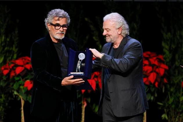 22nd Monte Carlo Film Festival - Awards Gala Night Paolo Genovese receives the Career Award from Giovanni Veronesi and Ezio Greggio the awards gala night held at Grimaldi Forum during 22nd Monte Carlo Film Festival on November 15, 2025 in Monte Carlo, Monaco. Photo Marco Piovanotto ABACAPRESS.COM Monte Carlo Monaco  Copyright: xPiovanottoxMarco ABACAx