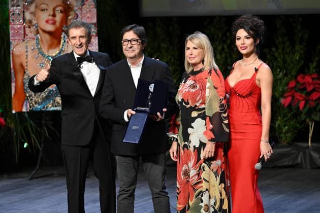 Monte Carlo, 22nd Monte Carlo Film Festival. Awards Ceremony. Pictured: Ezio Greggio, Manuel Gómez Pereirar, and Lavinia Circeo.  Copyright: xSimonexComix xipa-agency.netx xComi Mangiarottix IPA_Agency_IPA68022669