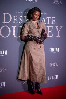 November 18, 2025, London, United Kingdom: A model attends the London Premiere of Desperate Journey at Odeon Luxe Leicester Square. London United Kingdom - ZUMAs197 20251118_aaa_s197_221 Copyright: xLoredanaxSangiulianox