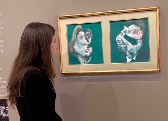 November 18, 2025, New York, New York, USA: A woman looks at Ã¢â‚¬ËœStudy for Head of Isabel Rawsthorne and George DyerÃ¢â‚¬â ¢ 1967, by artist Francis Bacon, estimate $13 million - $18 million, seen on display at the press preview for Marquee Week Fall 2025 Modern and Comtempory Art held at Phillips Auction House New York. New York USA - ZUMAk03_ 20251118_zaf_k03_117 Copyright: xNancyxKaszermanx