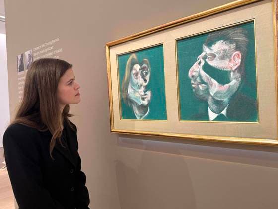 November 18, 2025, New York, New York, USA: A woman looks at Ã¢â‚¬ËœStudy for Head of Isabel Rawsthorne and George DyerÃ¢â‚¬â ¢ 1967, by artist Francis Bacon, estimate $13 million - $18 million, seen on display at the press preview for Marquee Week Fall 2025 Modern and Comtempory Art held at Phillips Auction House New York. New York USA - ZUMAk03_ 20251118_zaf_k03_120 Copyright: xNancyxKaszermanx